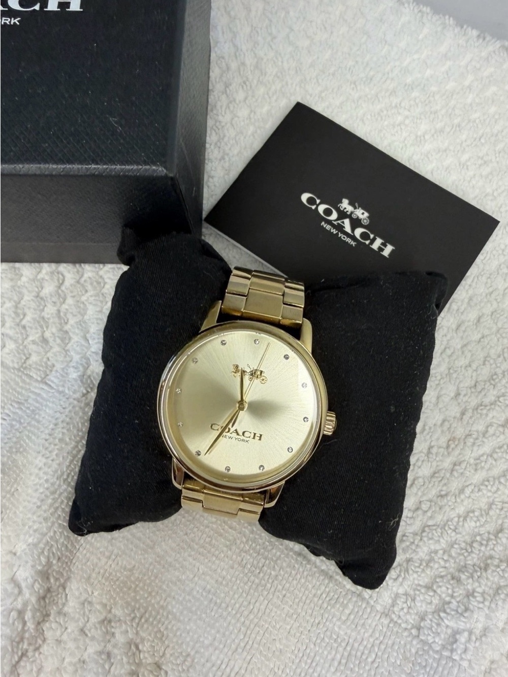 Coach woman’s Gold-Tone Bracelet Watch with box size 30mm crystal dial quartz